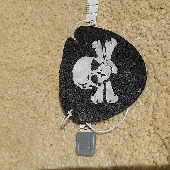 Pirate skull and bones hat, neck tie, and skull & bones eye patch. Kids Costume - Picture 2 of 4